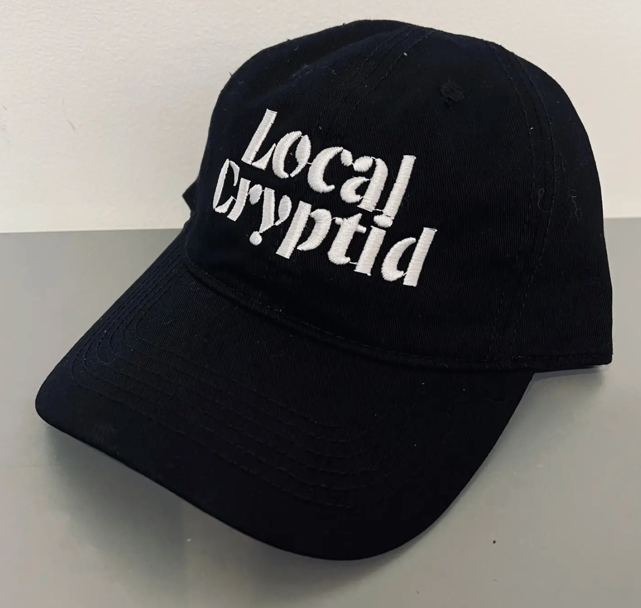 Witchwood Bags- Local Cryptid Embroidered Dad Hat