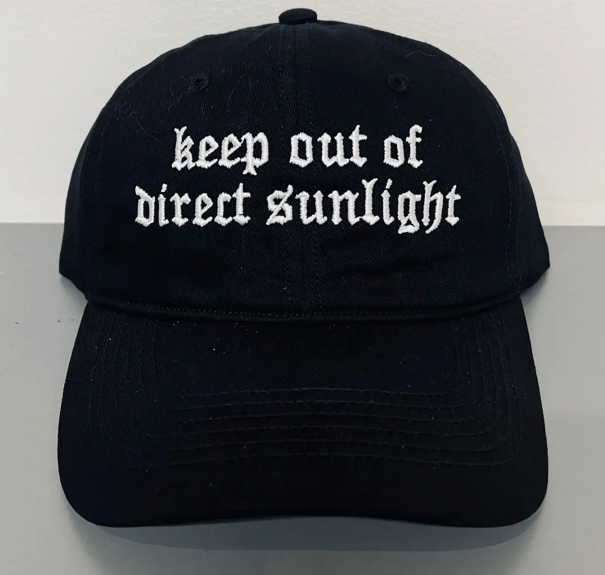 Witchwood Bags- Keep Out of Direct Sunlight Embroidered Dad Hat